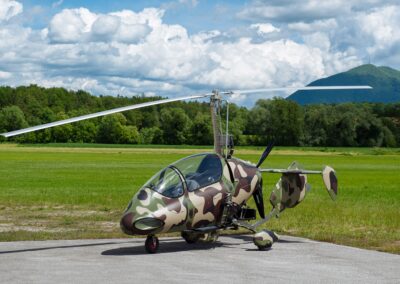 gyrocopter sitting on airstrip